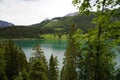 emerald-green alpine lake Haldensee in Austrian Alps of the Tannheim valley or Tannheimer Tal, Tirol, Austria