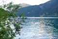 Scenic evening lake Achensee in Austria, green mountains rises above the calm expanse of water, concept of the beauty of nature,