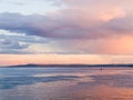 Scenic evening river landscape. Blue and pink sky at sunset. Russia, Saratov city, the Volga river