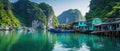 Scenic Fishing Village Hangs Above Tranquil Waters Amidst Picturesque Halong Bay