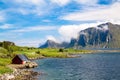 Scenic fjord Lofoten islands typical fishing hut Royalty Free Stock Photo