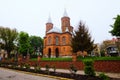 Scenic foggy landscape view of the street in the downtown. Ancient red brick The Armenian Church Royalty Free Stock Photo