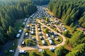 Scenic forest camping site with numerous rvs surrounded by tall pine trees Royalty Free Stock Photo