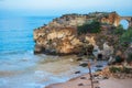 Scenic golden cliffs and emerald water, Lagos, Algarve region, Portugal