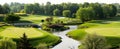 A scenic golf course with a bridge over a river surrounded by trees Royalty Free Stock Photo