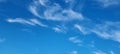 Scenic heavenly blue skies with scattered cirrus clouds