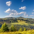 Scenic image of mountains with blue sky. Wonderful highlands in the springtime. Carpathian Romania. Instagram style