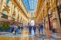 The scenic interior of Galleria Vittorio Emanuele II with luxury boutiques and restaurants, Milan, Italy