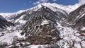 Scenic Kalasha Village in Bamburet Valley in North Pakistan at Winter. Aerial View Hindu Kush Muntain Range Himalayas.