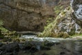 Scenic karst landscape and stone bridge near Zelske cave in national park Rakov Skocjan in Slovenia