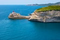 The scenic La Madonetta lighthouse on the rocky Punta San Antonio tip, Bonifacio, Corsica, France Royalty Free Stock Photo