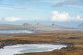 Scenic landscape with atlantic ocean shore, three mountains, hills and picturesque irish village during winter autumn season in Royalty Free Stock Photo