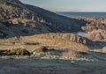 Scenic landscape of Holyrood Park on Salisbury Crags with cityscape of Edinburgh city Royalty Free Stock Photo