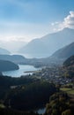 A scenic landscape with a lake and mountains in the background Royalty Free Stock Photo