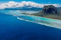 Scenic landscape of Le Morne mountain with ocean and lagoon in Mauritius. Aerial view
