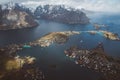 Scenic landscape of Lofoten islands: peaks, lakes, and houses. Reine village, rorbu, reinbringen