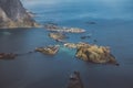 Scenic landscape of Lofoten islands: peaks, lakes, and houses. Reine village, rorbu, reinbringen