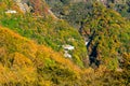 Scenic landscape of the mountain with colorful foliage of autumn season forest Royalty Free Stock Photo