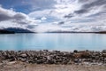 A scenic landscape of New Zealand Southern Alps and Lake Pukaki