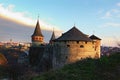 Scenic landscape photo of ancient stone fortress in the city of Kamianets-Podilskyi during winter sunset Royalty Free Stock Photo