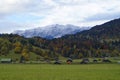 A scenic landscape of the picturesque Bavarian village Oberammergau and the snowy Alps (Germany)