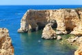 Scenic landscape of Praia da Marinha Arco Natural double arch cliffs in Algarve