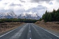 A scenic landscape of road to Aoraki Mount Cook - Lake Pukaki with blue sky and clouds. Royalty Free Stock Photo