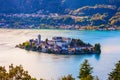 Wonderful landscape of San Giulio island inside Orta`s Lake, Piemonte, Italy Royalty Free Stock Photo