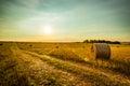 Scenic Landscape With Straw Bales On Agricultural Field At Sunrise Royalty Free Stock Photo