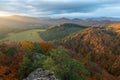 Scenic landscape in Sulov, Slovakia, on beautiful autumn sunrise with colorful leaves on trees in forest and bizarre pointy rocks Royalty Free Stock Photo