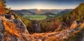 Scenic landscape in Sulov, Slovakia, on beautiful autumn sunrise with colorful leaves on trees in forest and bizarre pointy rocks Royalty Free Stock Photo