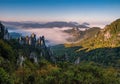 Scenic landscape in Sulov, Slovakia, on beautiful autumn sunrise with colorful leaves on trees in forest and bizarre pointy rocks Royalty Free Stock Photo