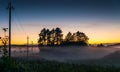 Sunset and mist in a countryside Royalty Free Stock Photo