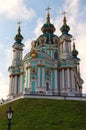 Scenic landscape view of ancient St. Andrew`s Church or the Cathedral of St. Andrew on the green hill against blue sky