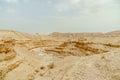 Scenic landscape view from cliff on dry desert in Israel. Royalty Free Stock Photo