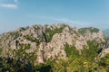 Scenic landscape view of limestone mountain with cliff in tropical forest. Royalty Free Stock Photo