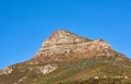 scenic landscape view of Lions Head in Cape Town, South Africa against a clear blue sky background from below with Royalty Free Stock Photo