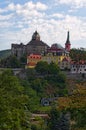 Scenic landscape view of medieval Loket Castle with colorful buildings by summer sunny day. Bohemia, Sokolov, Karlovarsky Region