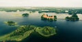 Scenic Lithuanian famous Trakai castle aerial view and islands in overcast day in summer.Historical travel destination in baltics Royalty Free Stock Photo