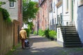 Senior man between scenic medieval Wall Houses,Amersfoort, Netherlands