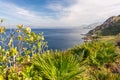 Scenic Mediterranean coastline with typical vegetation and mountains