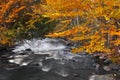 Ontonagon river surrounded with fall foliage Royalty Free Stock Photo