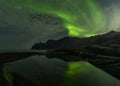 Scenic midnight landscape with Aurora Borealis