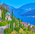 Tall cypress trees and Monumental Cemetery of Morcote, Switzerland Royalty Free Stock Photo