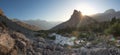 Scenic morning landscape of Fann mountains, Pamir-Alay, Tajikistan. Panorama of Fann mountain range with river in morning sunlight Royalty Free Stock Photo