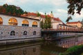 Scenic morning view old part of Ljubljana. River Ljubljanica with Butcher`s Bridge, Kresija building. Royalty Free Stock Photo