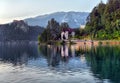 Scenic morning view of St. Martin`s Parish Church near Bled Lake. Beautiful autumn weather during sunrise. Royalty Free Stock Photo