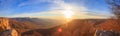 Scenic mountain landscape with autumnal hills, cloudy blue sky a Royalty Free Stock Photo