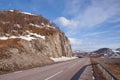 Scenic mountain road on sunny day