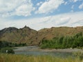 Mountainside view with Soshone River flowing along the North Fork Highway in Wyoming Royalty Free Stock Photo